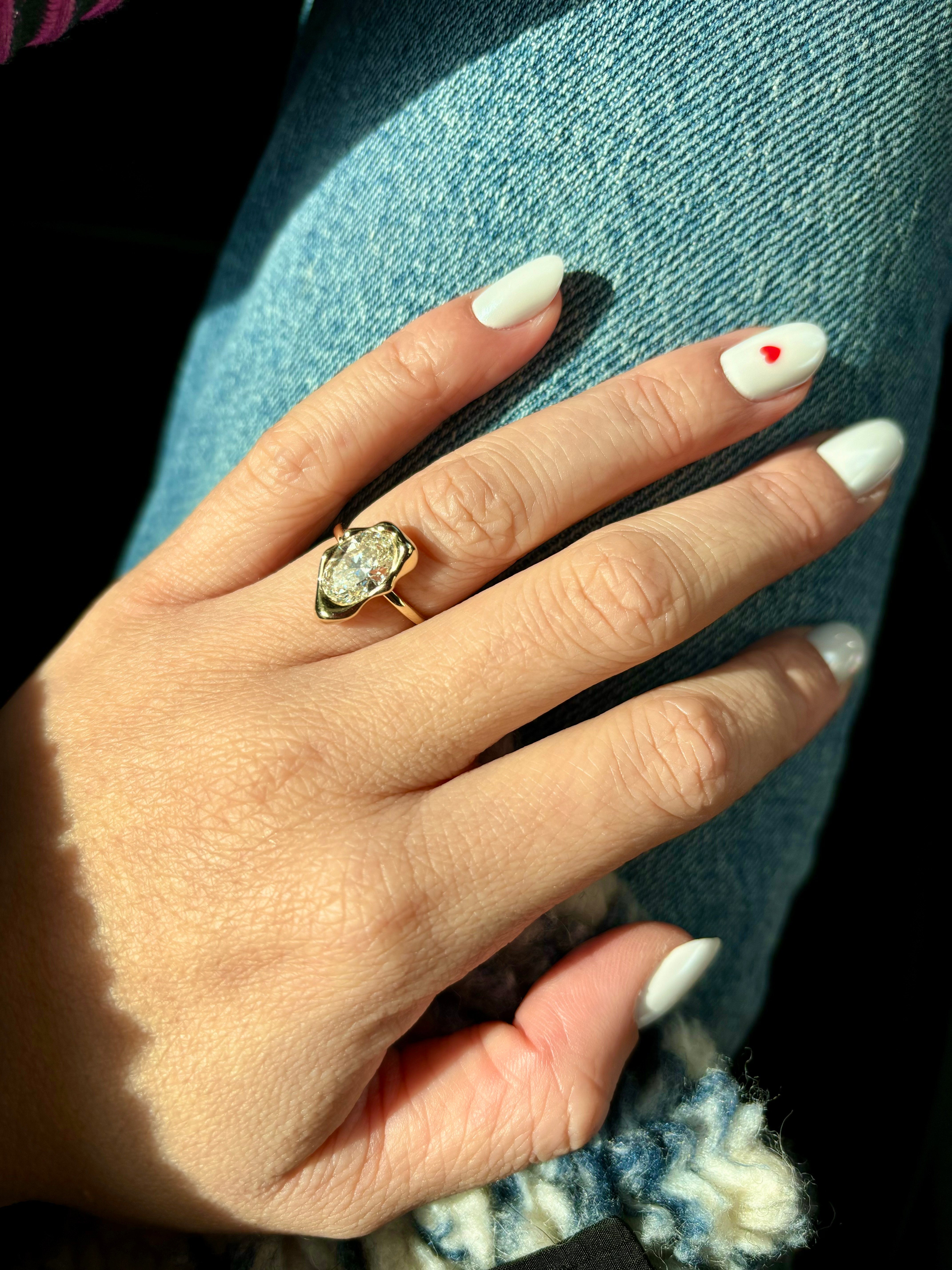 Dali Ring with 2 carat oval diamond