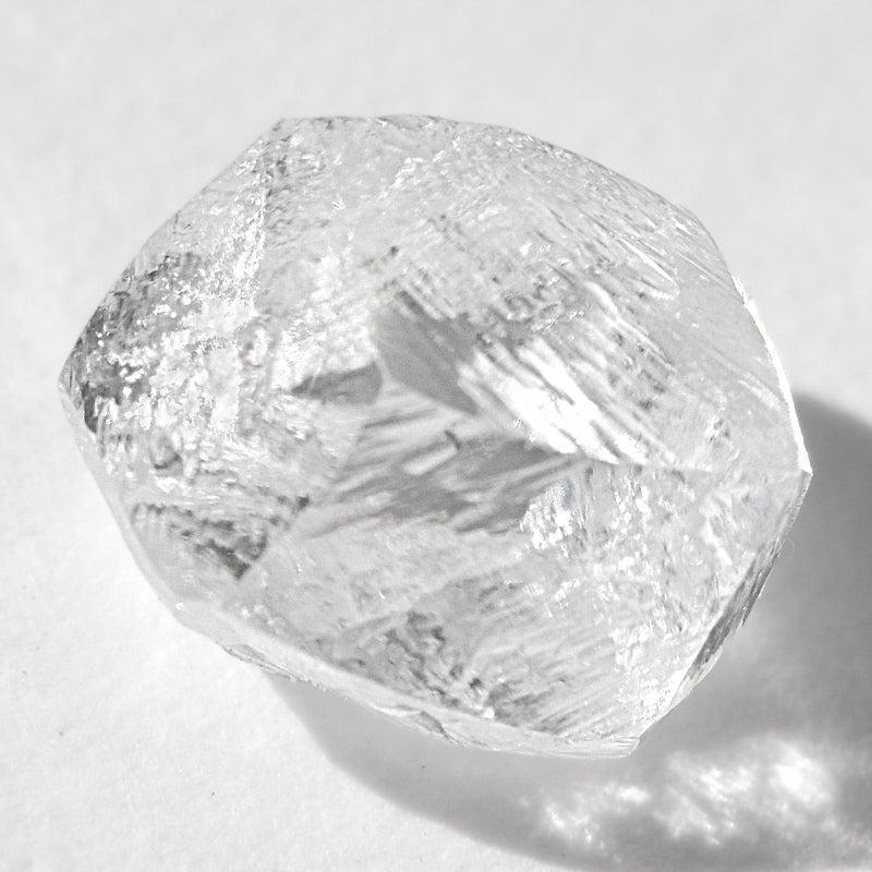 1.28 carat clean and clear rough diamond dodecahedron