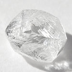1.28 carat clean and clear rough diamond dodecahedron