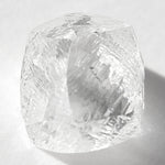 1.28 carat clean and clear rough diamond dodecahedron