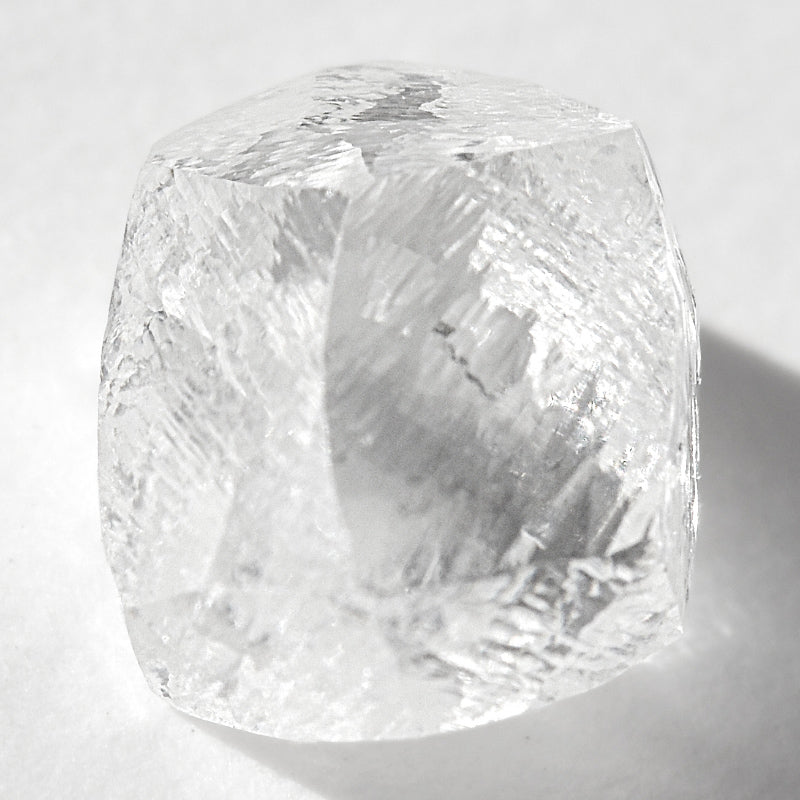 1.28 carat clean and clear rough diamond dodecahedron