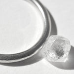 1.28 carat clean and clear rough diamond dodecahedron