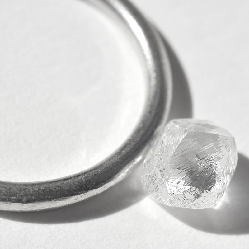 1.28 carat clean and clear rough diamond dodecahedron