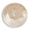 0.64 carat champagne colored round brilliant rough cut diamond