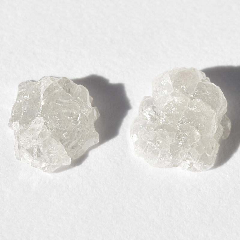 0.78 carat white crystal freeform pair of raw diamonds