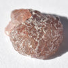 1.25 carat dark red freeform crystally raw diamond
