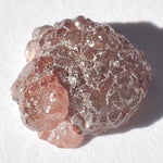 1.25 carat dark red freeform crystally raw diamond