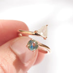 The Teumim Ring | A toi et moi ring with a rough diamond and teal sapphire