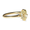 Fancy yellow raw diamond ring with compass prongs in 14k yellow gold