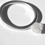 0.85 carat white and silver freeform raw diamond