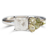 Raw diamond with side clustered green spectrum raw diamonds in white gold