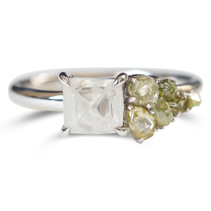 Raw diamond with side clustered green spectrum raw diamonds in white gold