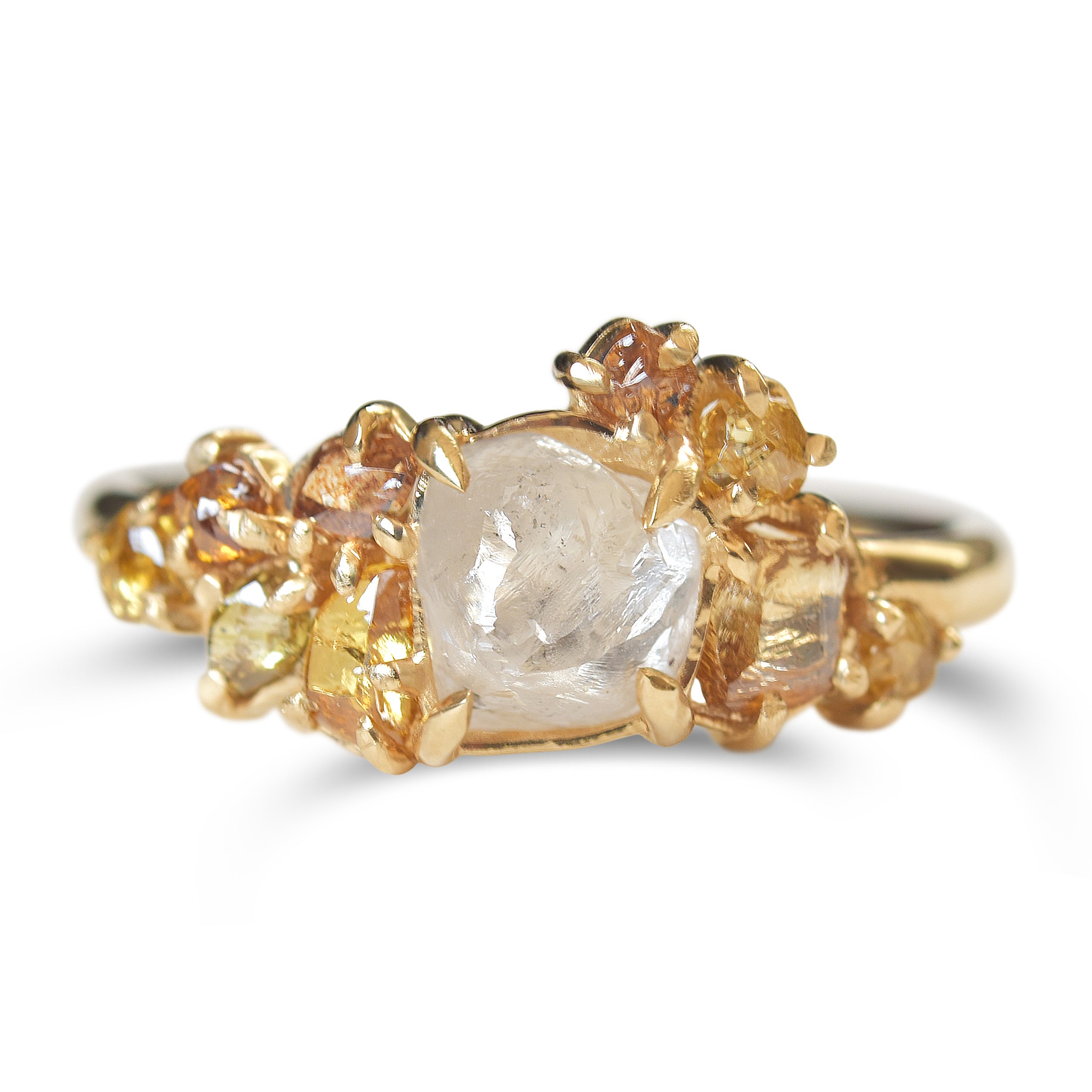 Raw diamond with clustered golden raw diamonds in yellow gold