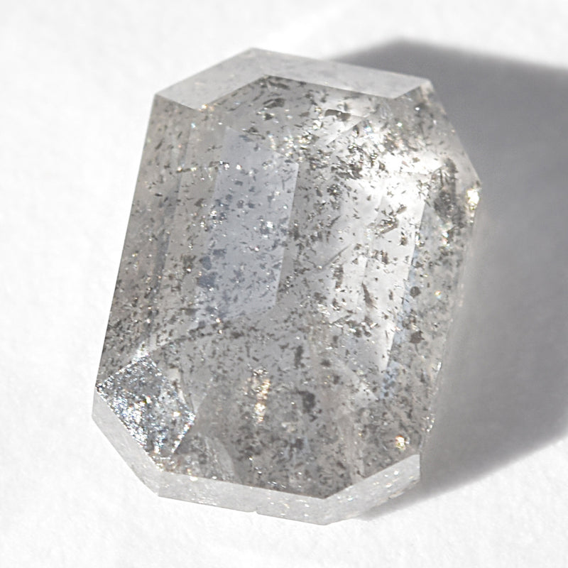 0.53 carat emerald cut salt and pepper rough cut diamond