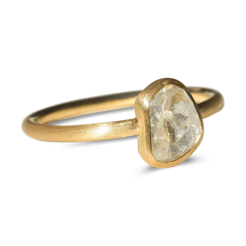 Brushed bezel raw diamond ring with 1.2 carat rough diamond in 14k yellow gold