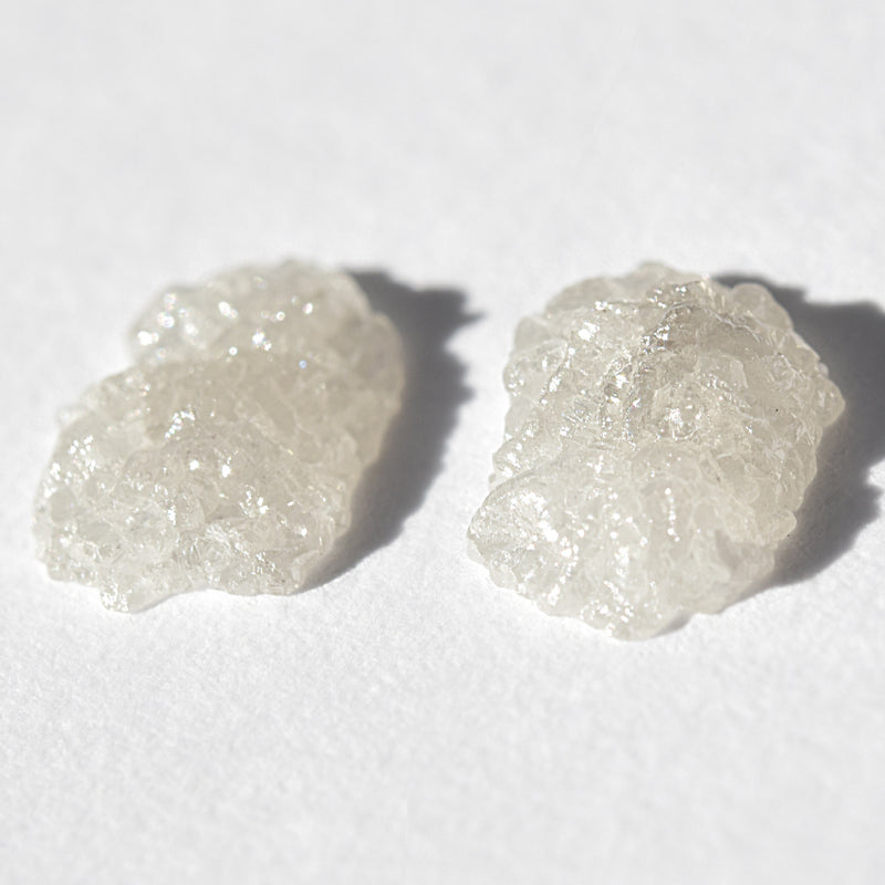 0.71 carat pair of freeform rough diamond crystals