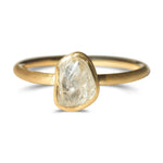 Brushed bezel raw diamond ring with 1.2 carat rough diamond in 14k yellow gold