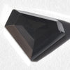 1.05 carat jet black triangle rough cut diamond