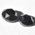 0.81 carat jet black rosecut round diamond pair