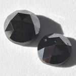 0.81 carat jet black rosecut round diamond pair