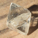 0.94 carat intense and perfect looking rough diamond octahedron