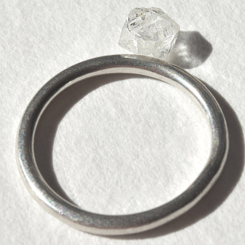 0.86 carat clean and clear raw diamond octahedron