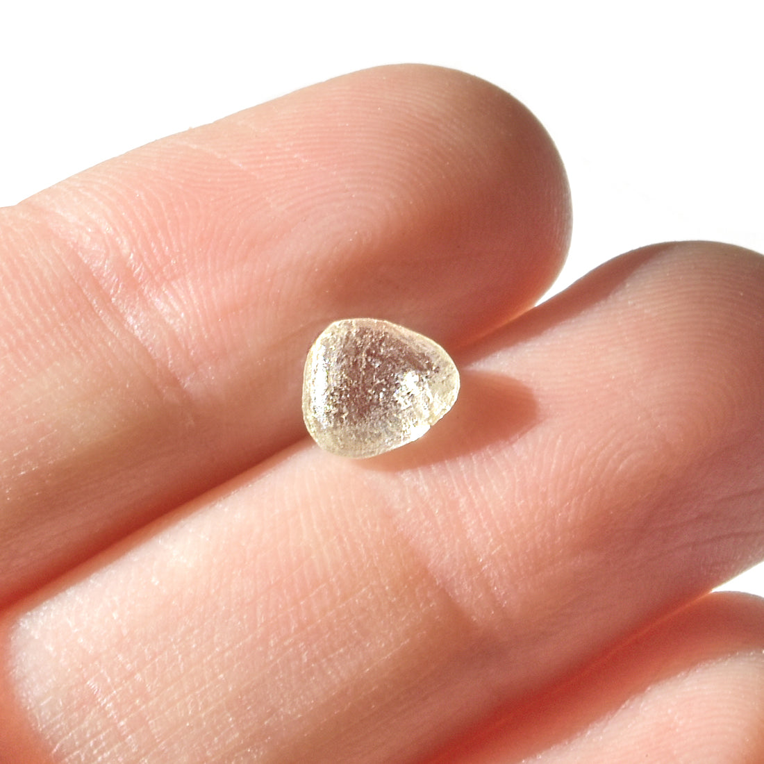 1.35 carat glowing and smooth, triangular rough diamond