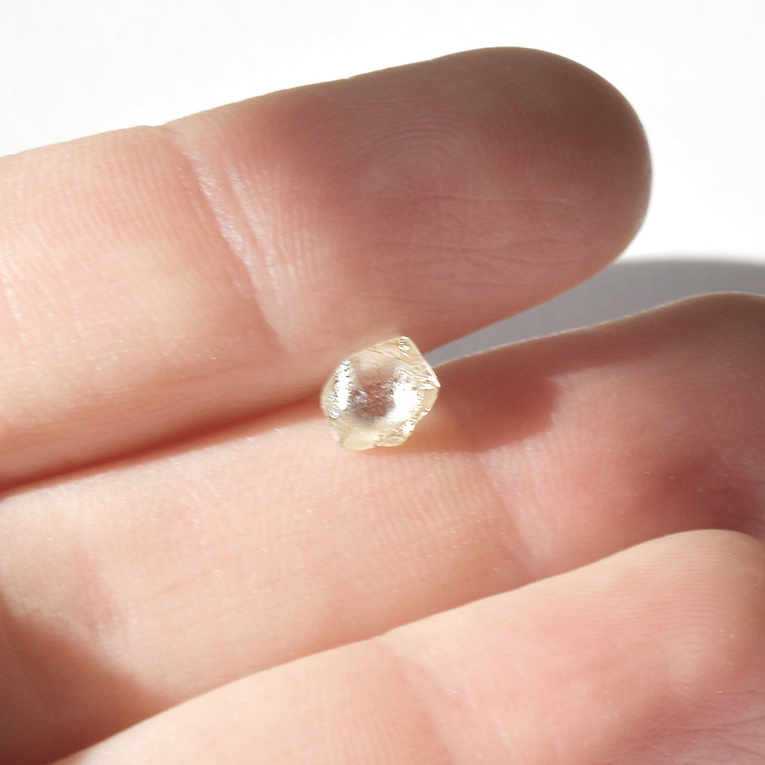 0.88 carat clear and beautiful dodecahedral raw diamond