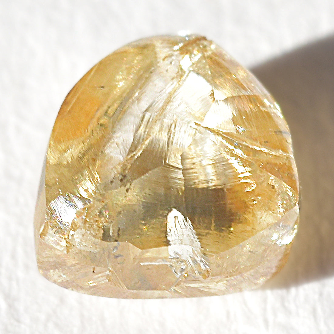0.77 carat amazing autumnal raw diamond triangle