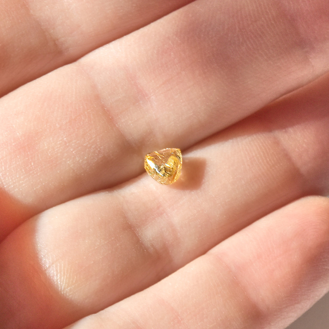 0.77 carat amazing autumnal raw diamond triangle