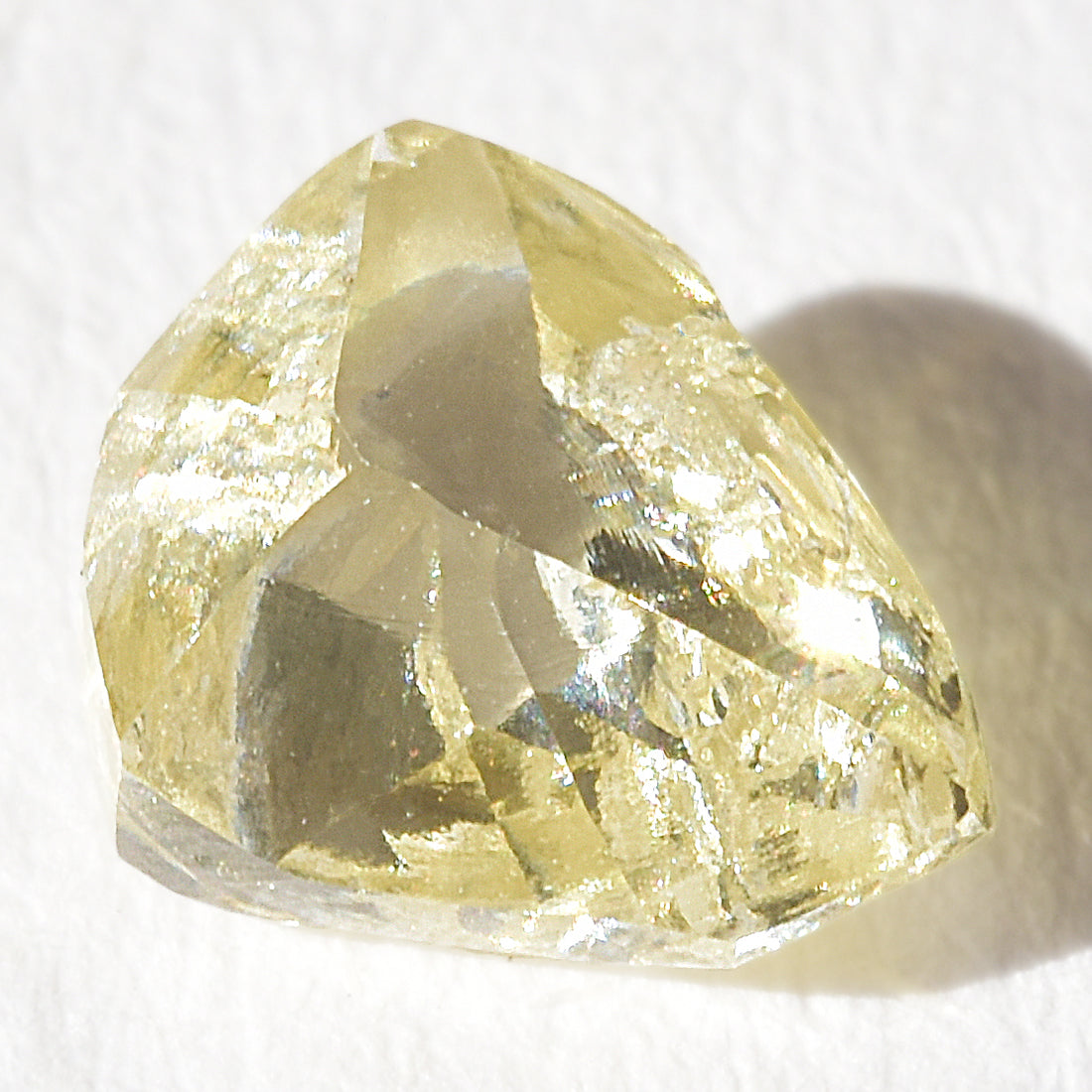 0.71 carat sunshiney raw diamond triangle