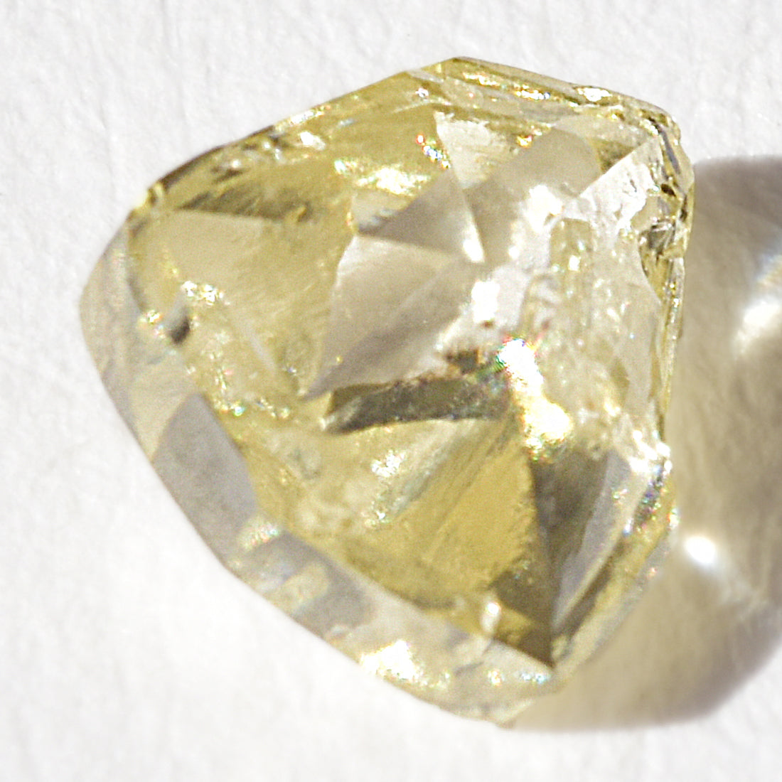 0.71 carat sunshiney raw diamond triangle