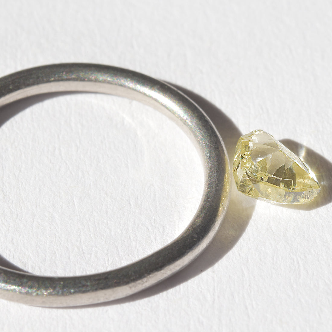 0.71 carat sunshiney raw diamond triangle