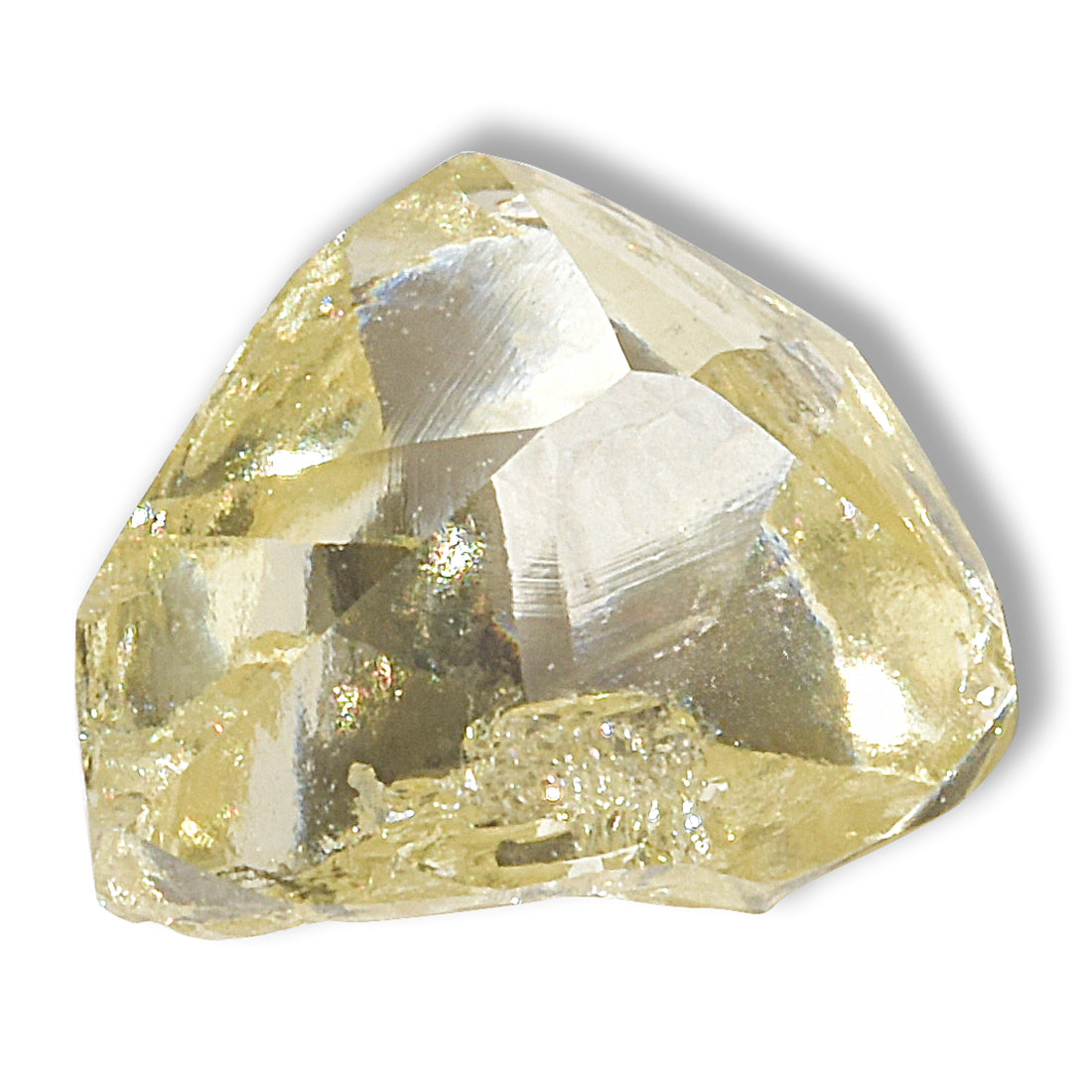 0.71 carat sunshiney raw diamond triangle