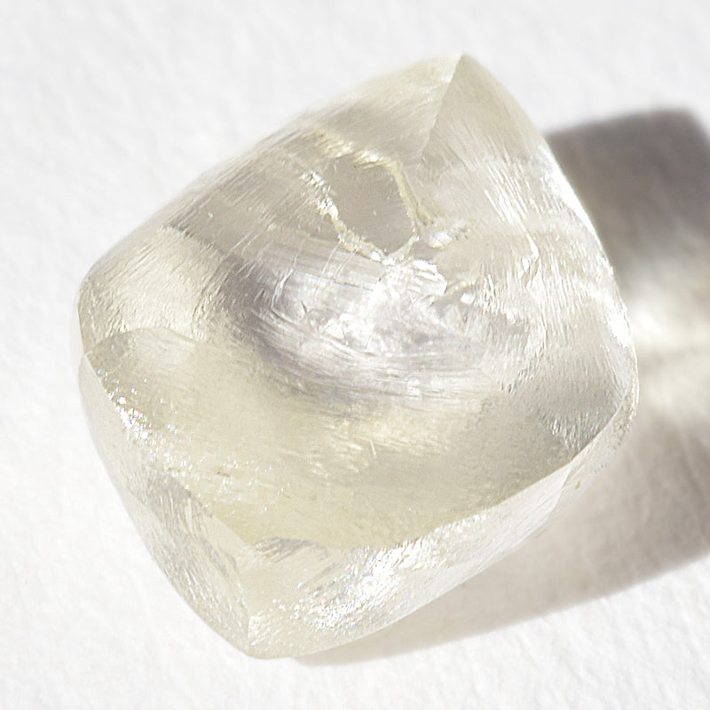 1.44 carat light champagne rhombododecahedral raw diamond