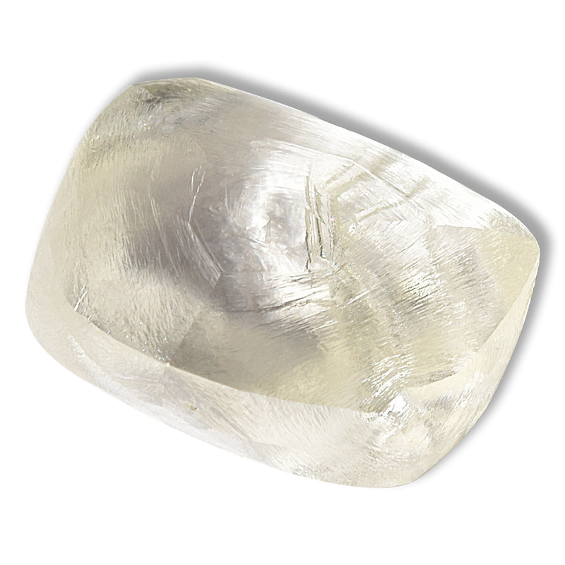 1.44 carat light champagne rhombododecahedral raw diamond