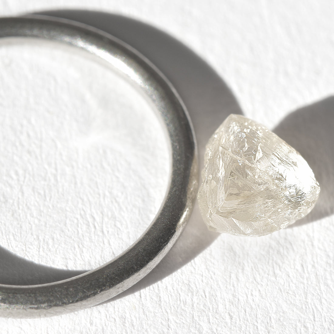 1.62 carat sparkly and pink raw diamond macle