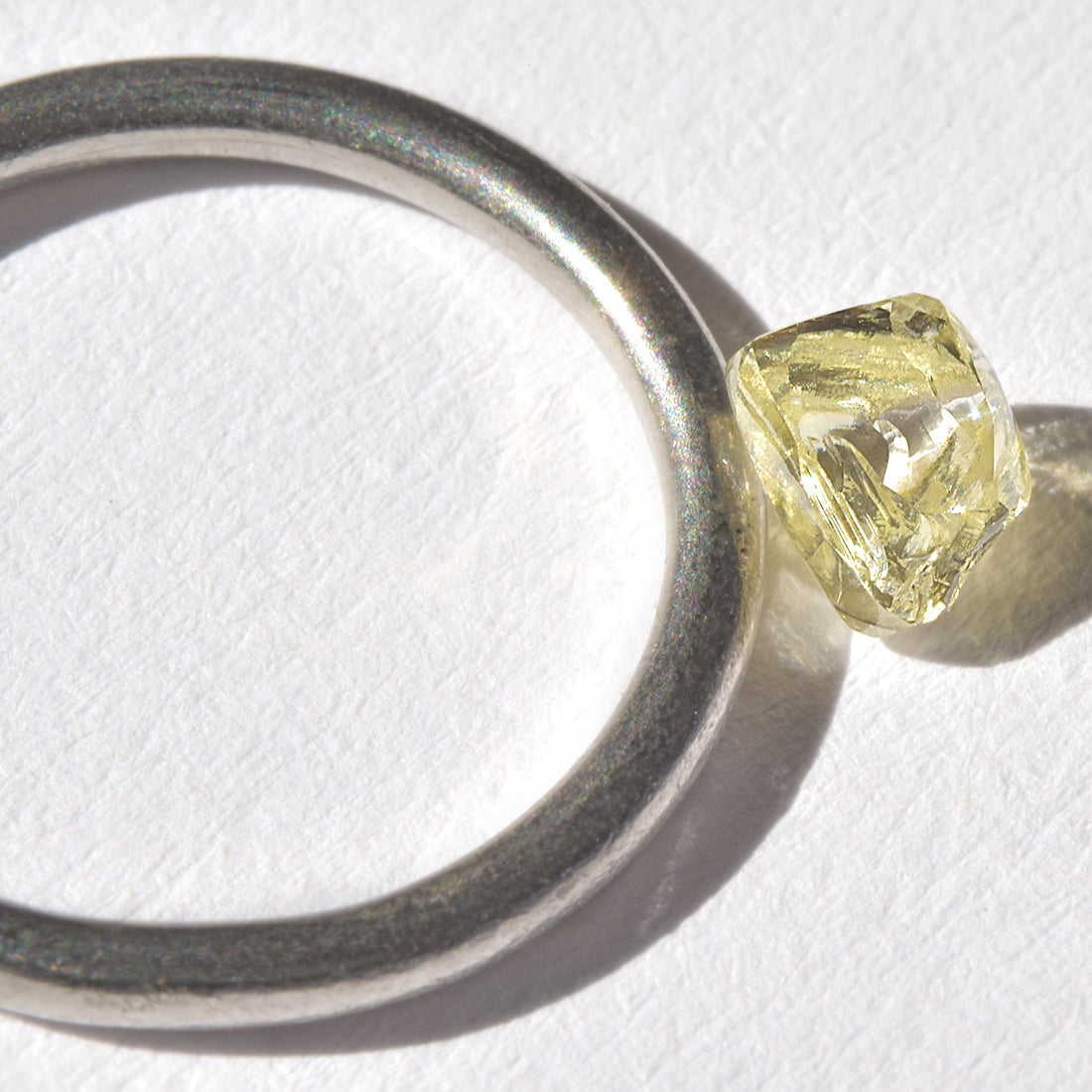 0.71 carat clean and clear macle raw diamond