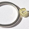 0.71 carat clean and clear macle raw diamond