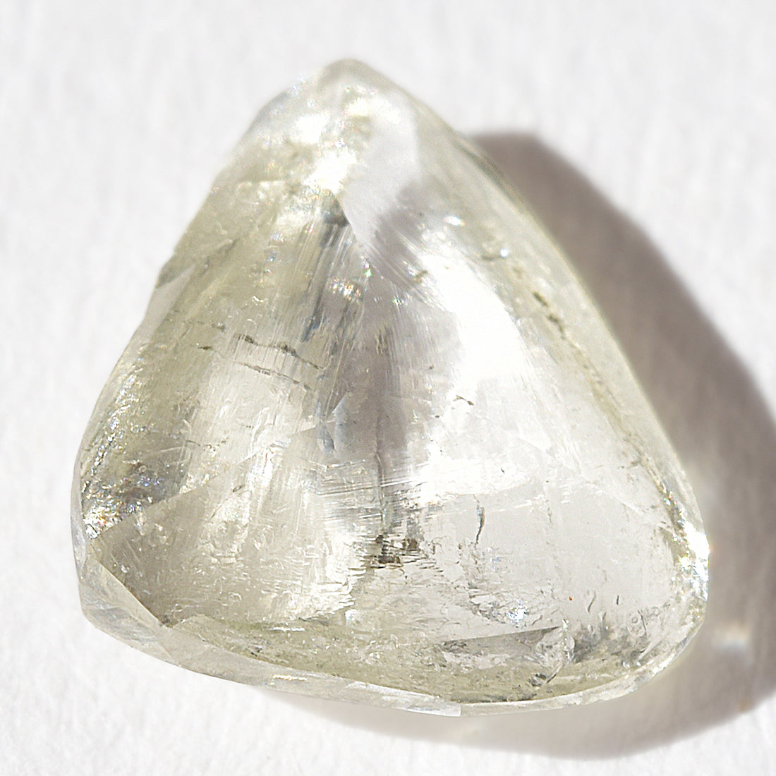 1.2 carat stunning champagne-green raw diamond triangle