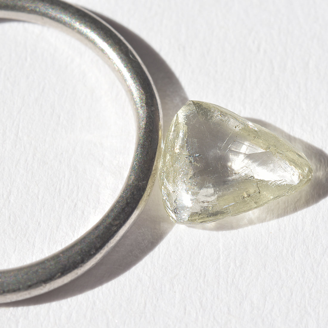 1.2 carat stunning champagne-green raw diamond triangle