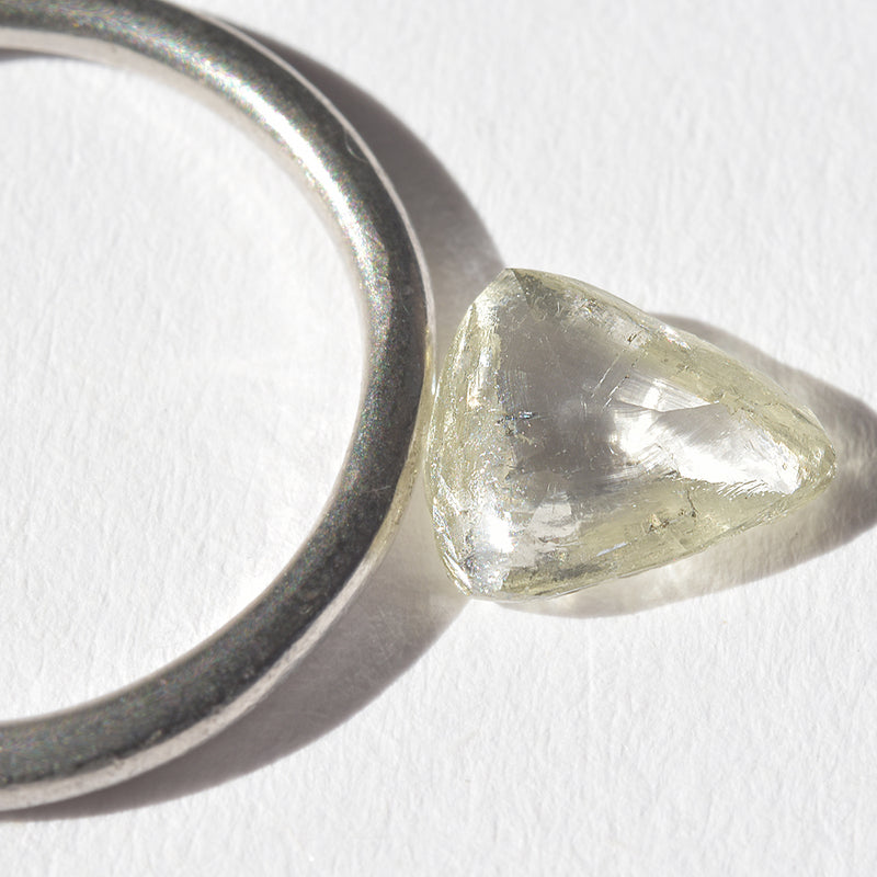 1.2 carat stunning champagne-green raw diamond triangle