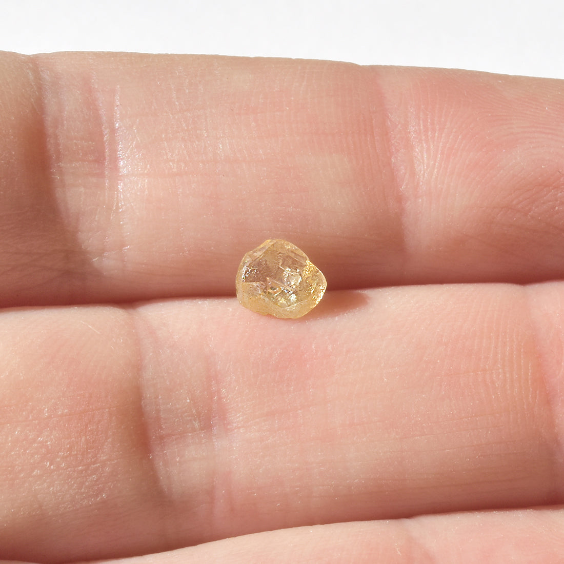0.75 carat sweet peachy freeform raw diamond