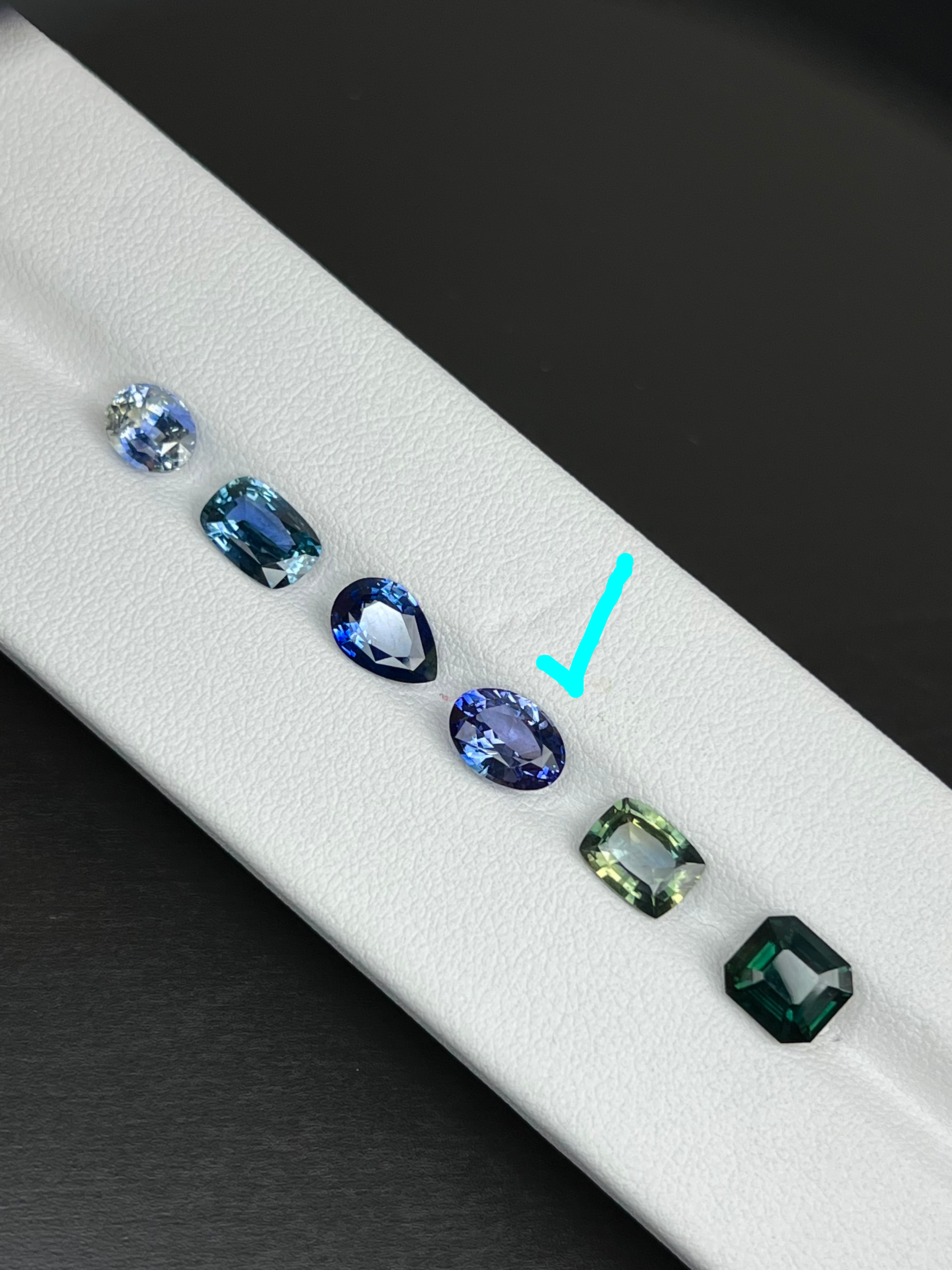 Set of colorful gemstones on a white background