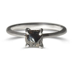 Black raw diamond solitaire
