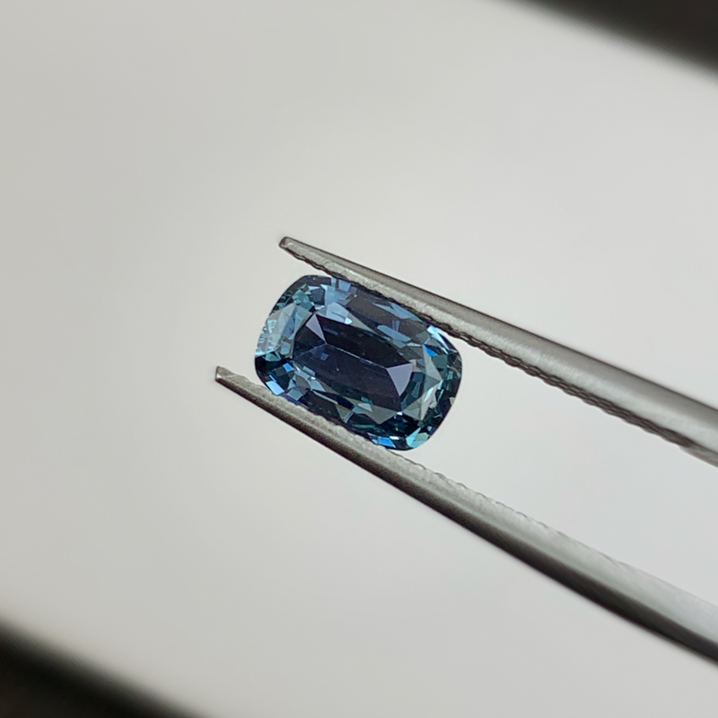 1.35 carat blueish-green cushion cut sapphire from Madagascar