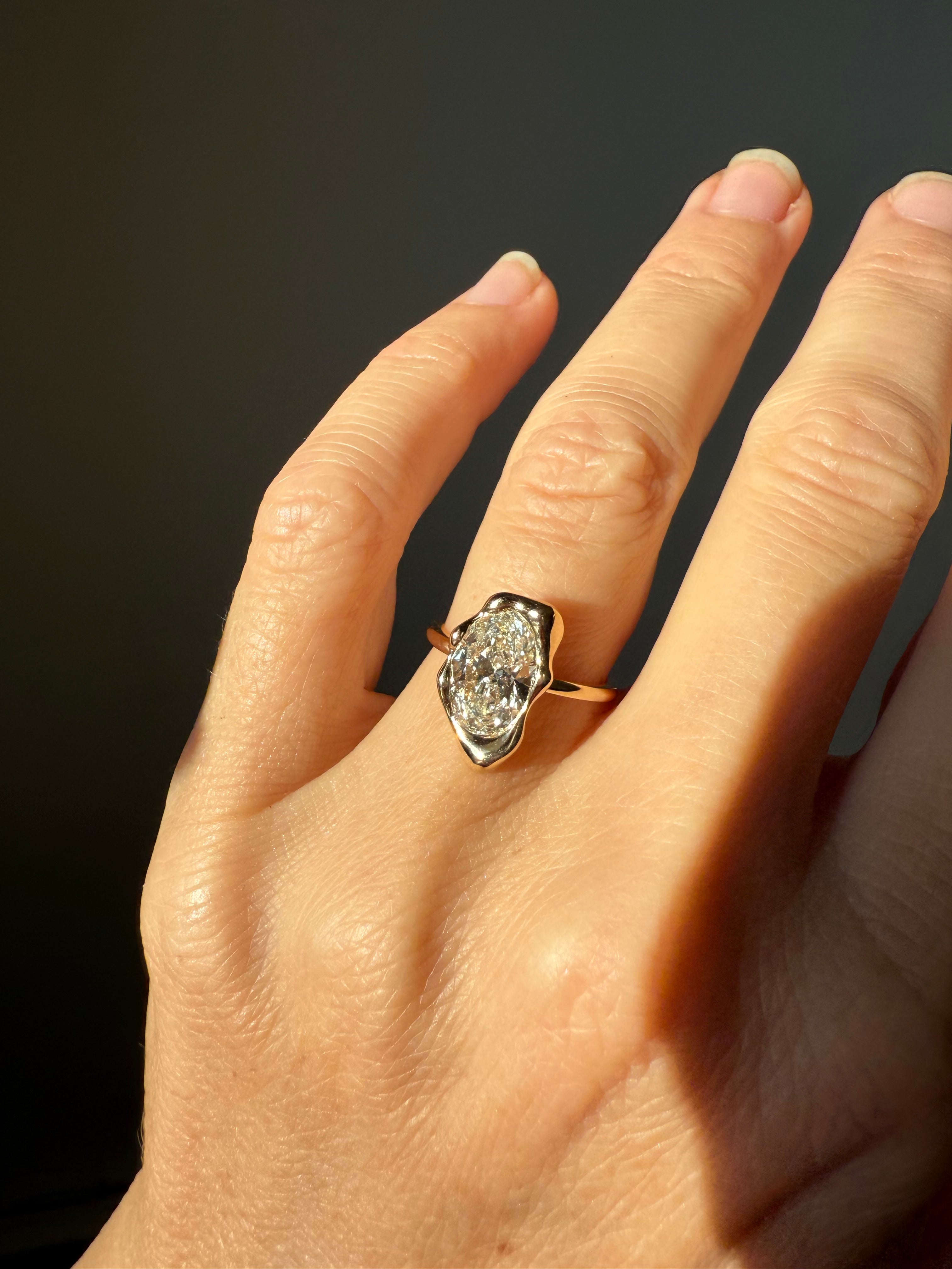 Dali Ring with 2 carat oval diamond