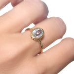 Ethereal white sapphire bezel set ring in 14k yellow gold