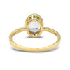 Ethereal white sapphire bezel set ring in 14k yellow gold