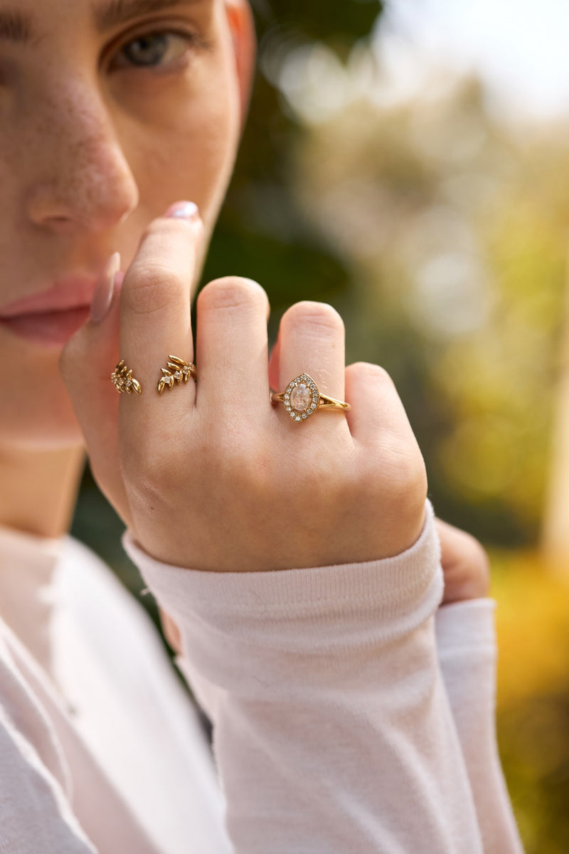 Raw diamond halo ring in 14k yellow gold